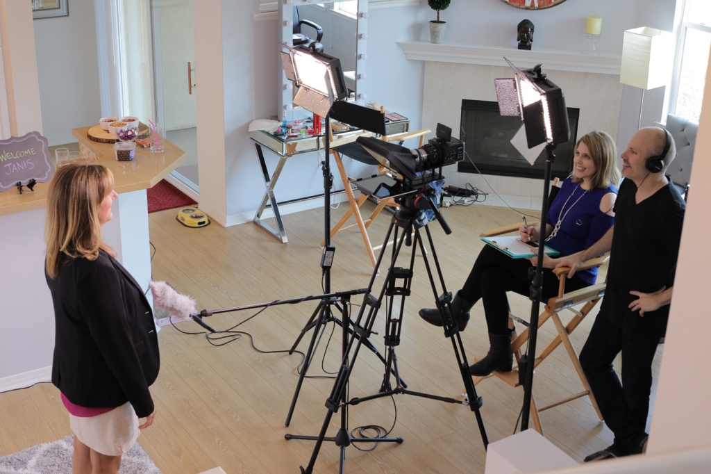 Steve and Jaime filming a client at the client's living space.